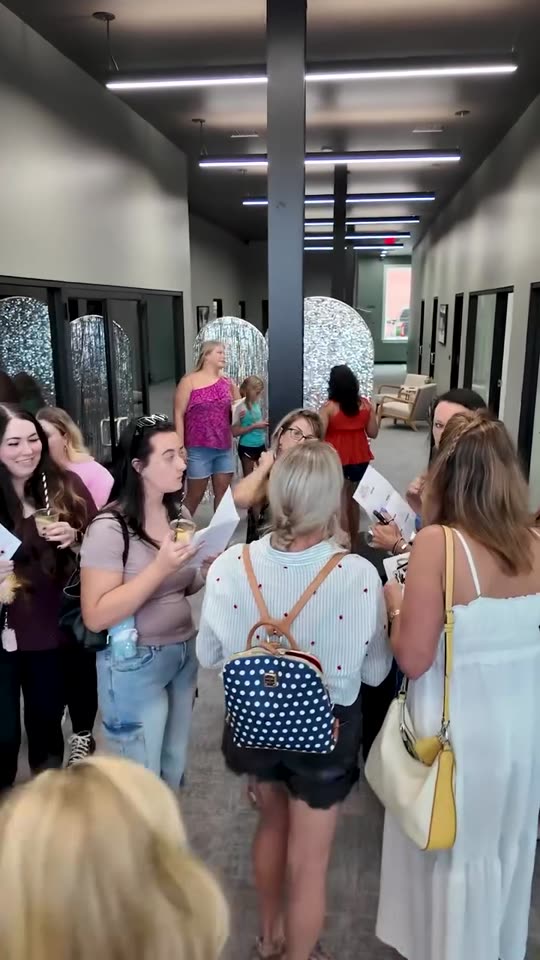 Orr Salon and Med Spa reel: guests touring the spa at an open house