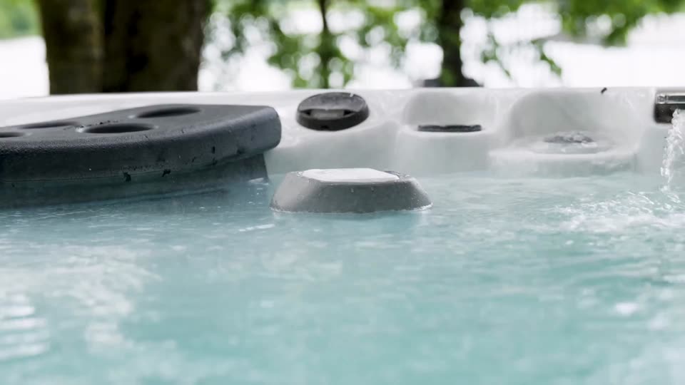 PureZone header video: water swirling in a hot tub